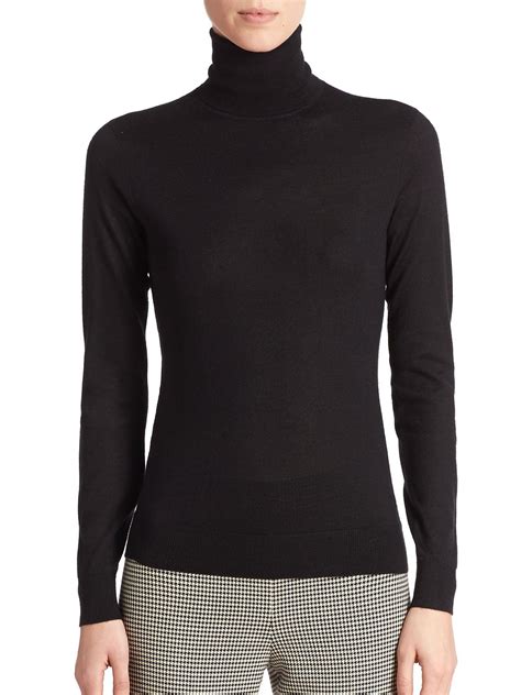 Black Jersey Turtleneck Top .